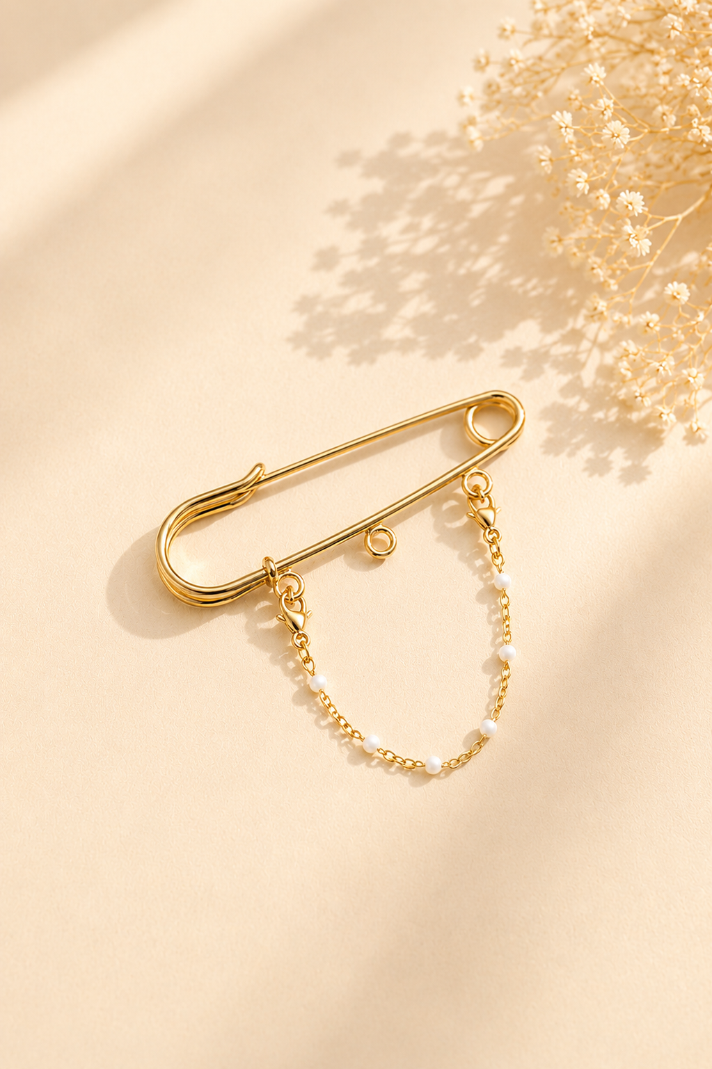 Chaîne pour broche perles blanc