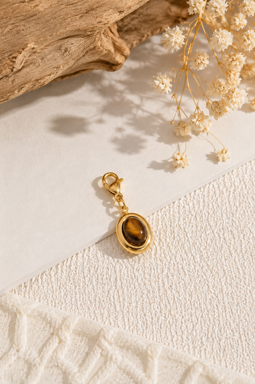 Charms pierre brune